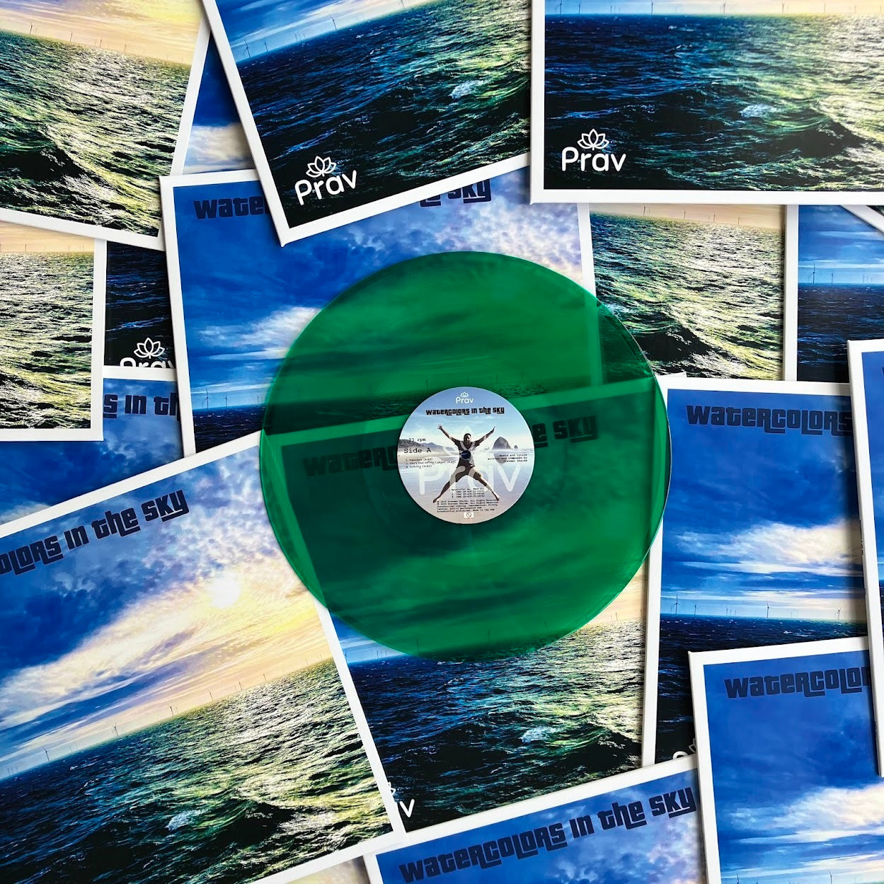Clear/translucent green 12" vinyl record made by Hellbender Vinyl