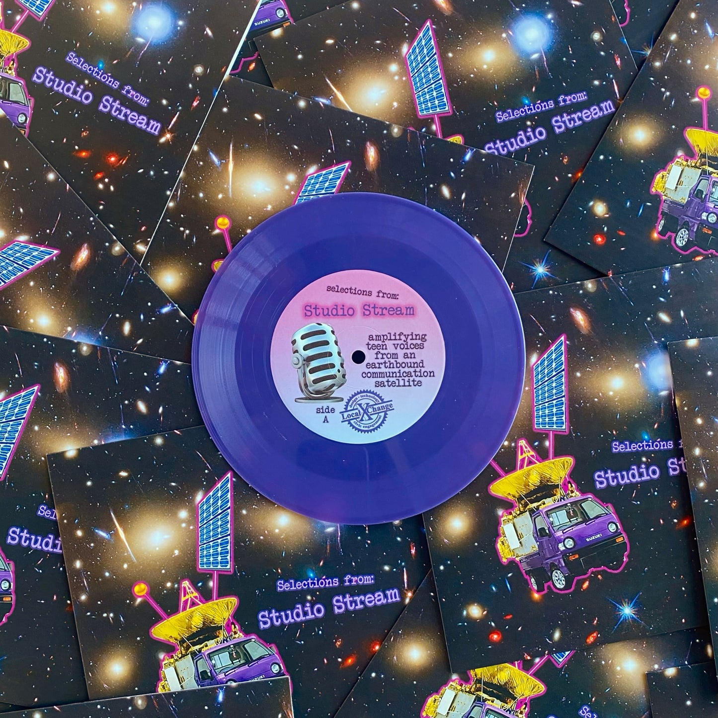A 7" purple vinyl record pressed by Hellbender Vinyl