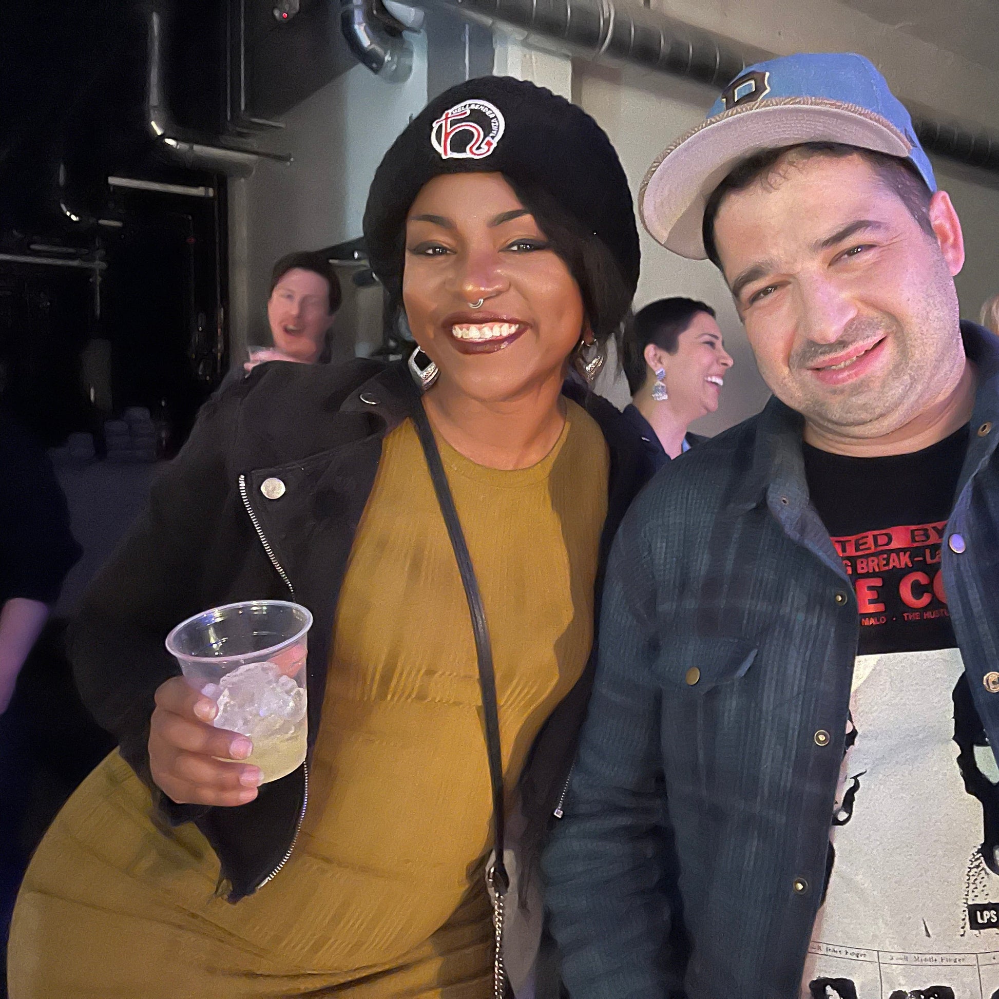 Woman wearing a Hellbender Vinyl beanie