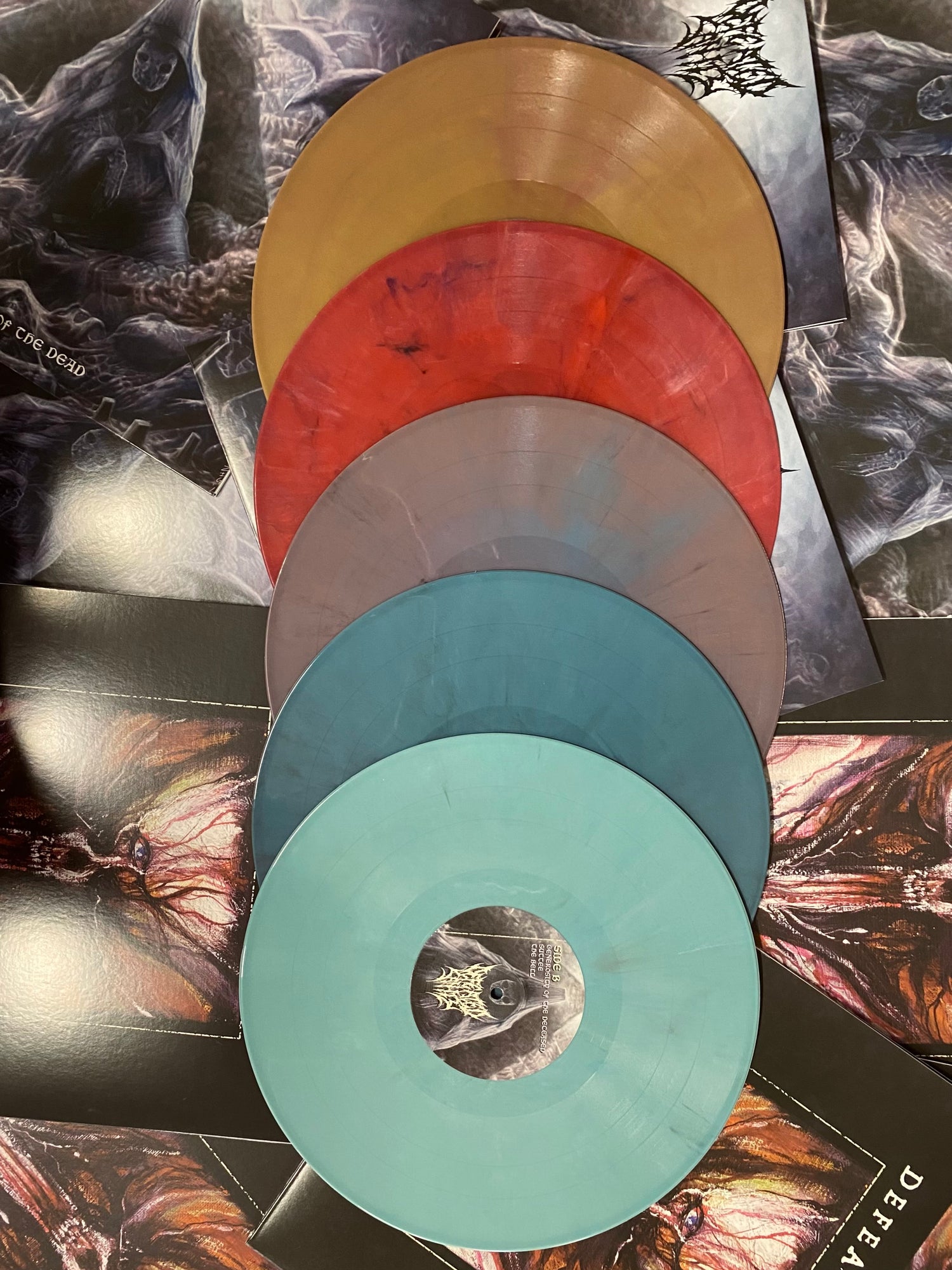 Five vinyl records in multiple color variants, created by Hellbender Vinyl for Willowtip Records