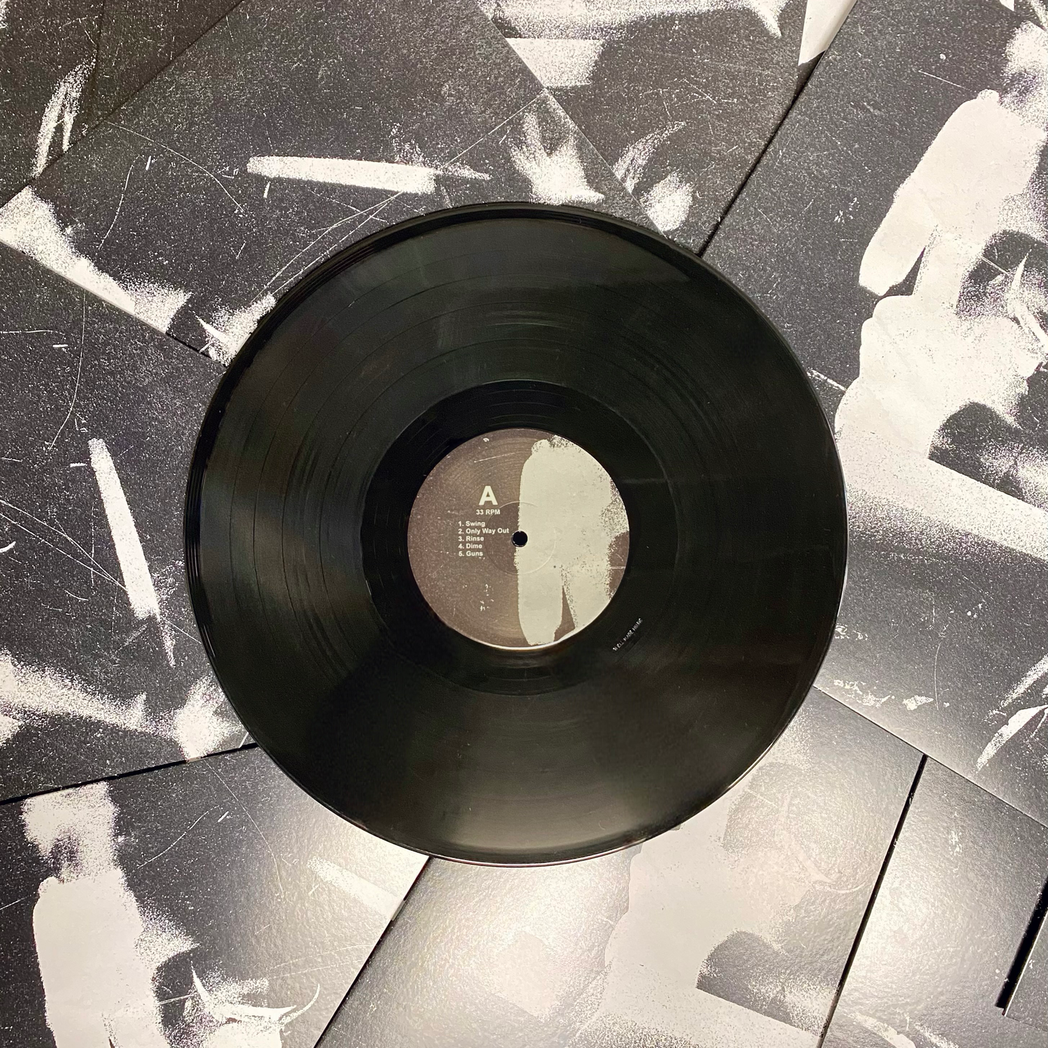 150g black vinyl record on top of LP jackets