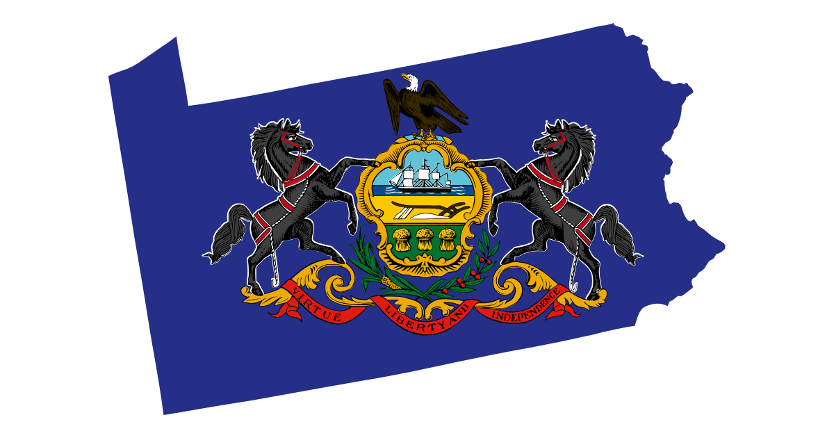 The state outline of Pennsylvania filled with the state flag, including a blue field and the detailed state coat of arms with horses, eagle, and shield, shown on a white background.