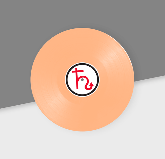 Peach disc with a logo on a gray background